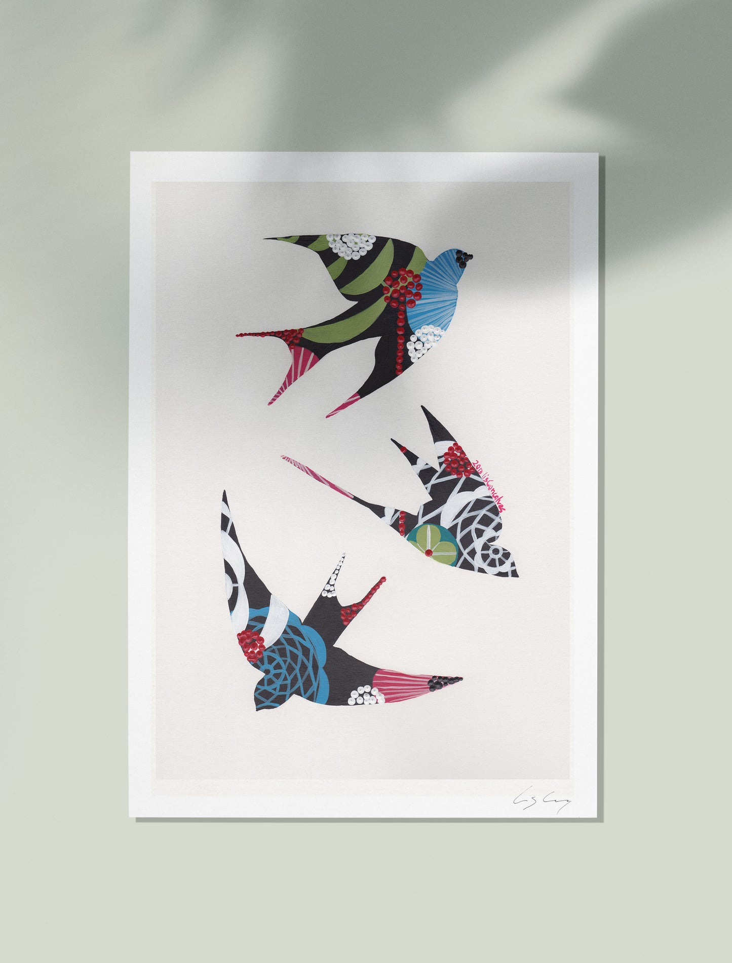 An unframed fine art print, by Lis Gonçalves. Open edition, signed by the artist (printed in Hahnemühle matt fibre paper) featuring colorful swallows on a light gray background