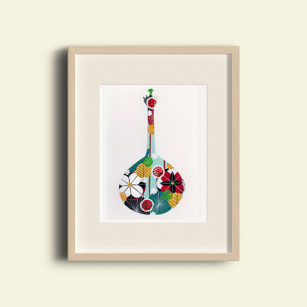 A framed fine art print, by Lis Gonçalves. Open edition, signed by the artist (printed in Hahnemühle matt fibre paper) featuring a colorful Portuguese guitar on a beige background