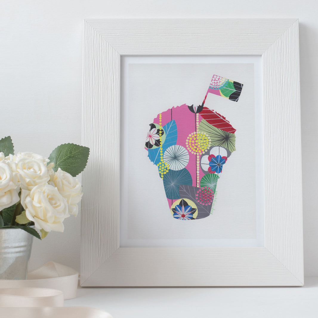 A framed fine art print, by Lis Gonçalves. Open edition, signed by the artist (printed in Hahnemühle matt fibre paper) featuring a colorful abstract art piece on a white surface with flowers and candles.