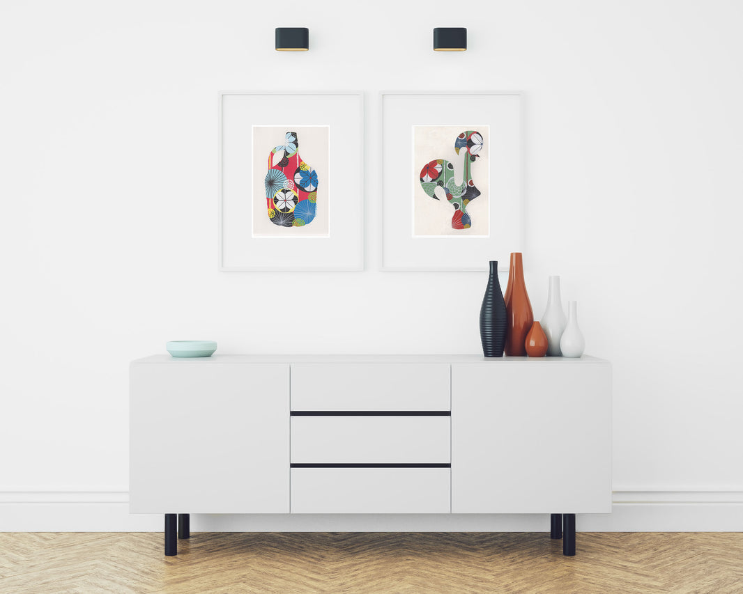 Two framed fine art prints, by Lis Gonçalves. Open edition, signed by the artist (printed in Hahnemühle matt fibre paper) featuring a colorful Portuguese rooster and a wine demijohn in a modern living room with white sideboard and decorative vases.