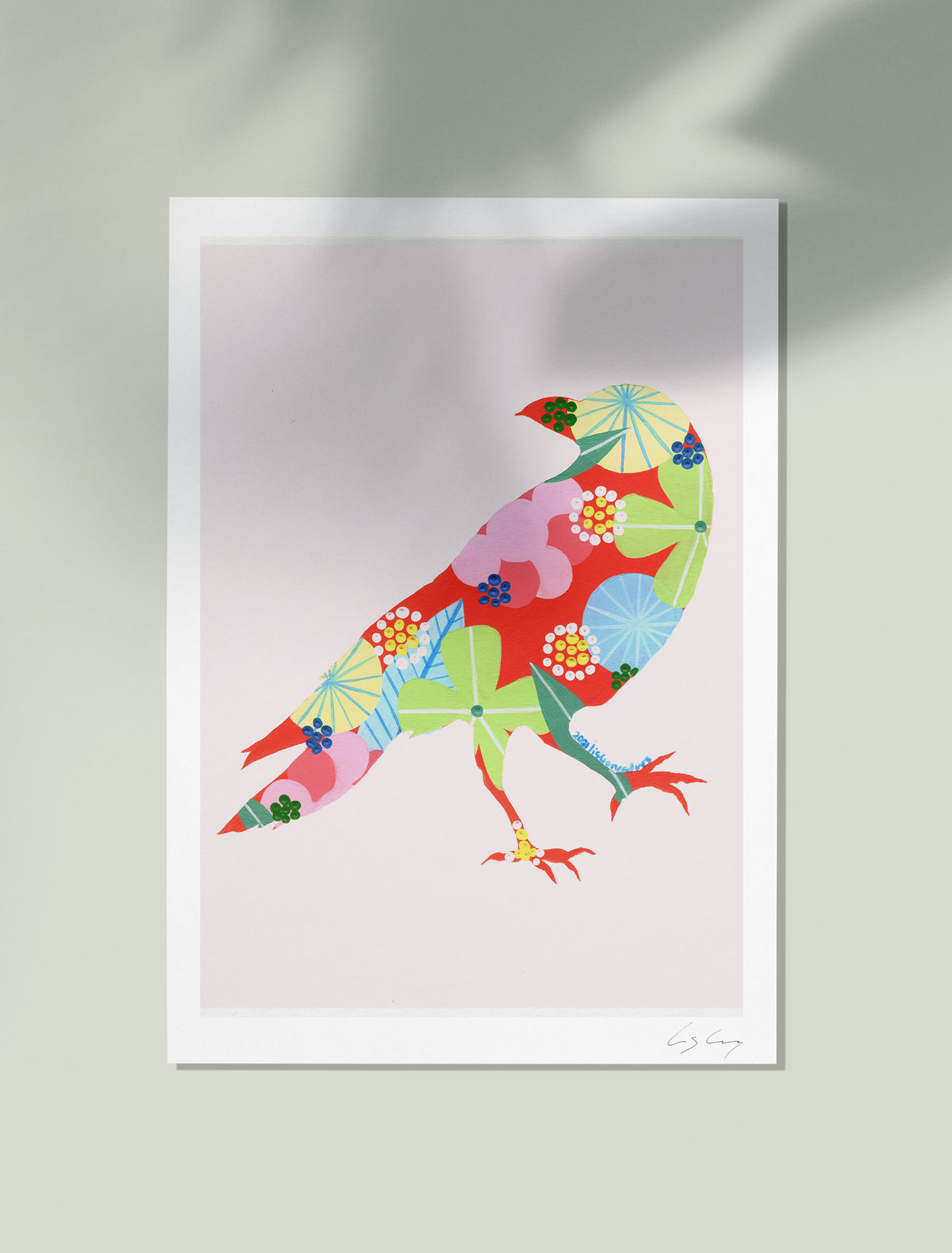 A framed fine art print, by Lis Gonçalves. Open edition, signed by the artist (printed in Hahnemühle matt fibre paper) featuring a colorful raven illustration on a light pink background