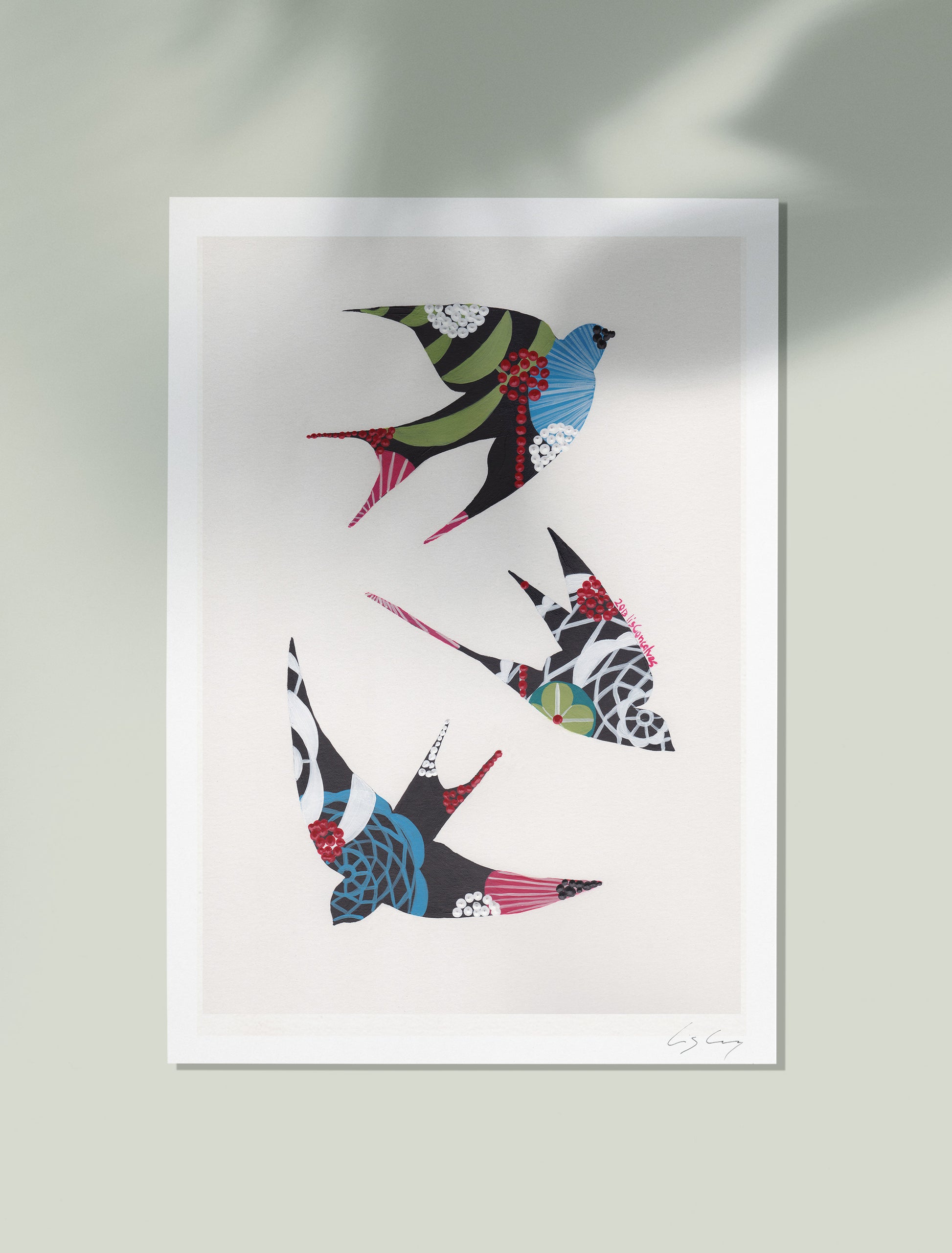 An unframed fine art print, by Lis Gonçalves. Open edition, signed by the artist (printed in Hahnemühle matt fibre paper) featuring colorful swallows on a light gray background