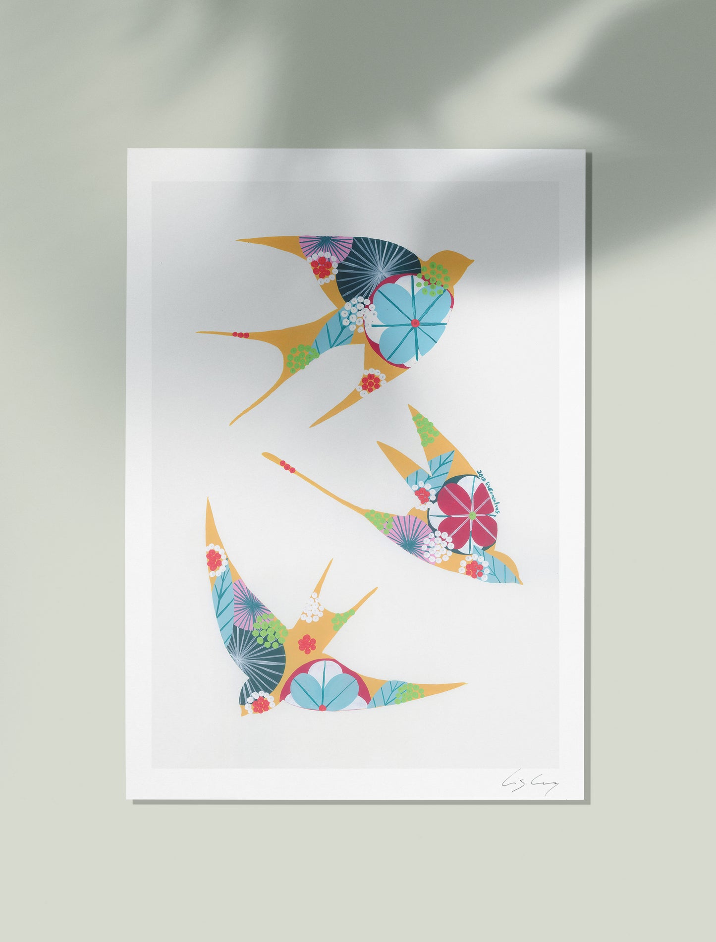 An unframed fine art print, by Lis Gonçalves. Open edition, signed by the artist (printed in Hahnemühle matt fibre paper) featuring colorful swallows on a white background