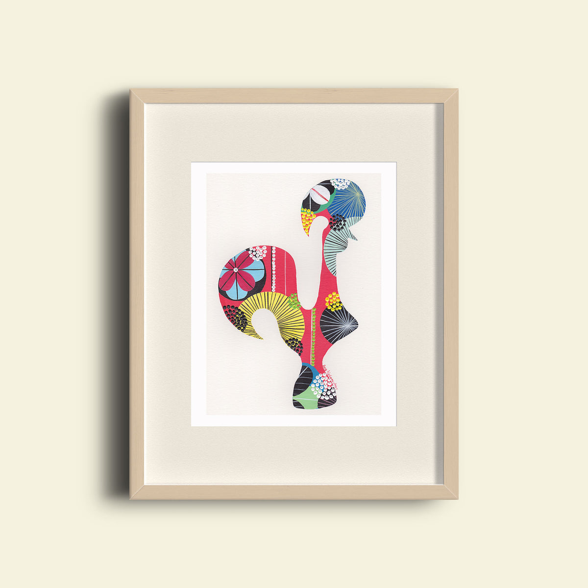 A framed fine art print, by Lis Gonçalves. Open edition, signed by the artist (printed in Hahnemühle matt fibre paper) featuring a colorful Portuguese rooster on a beige wall