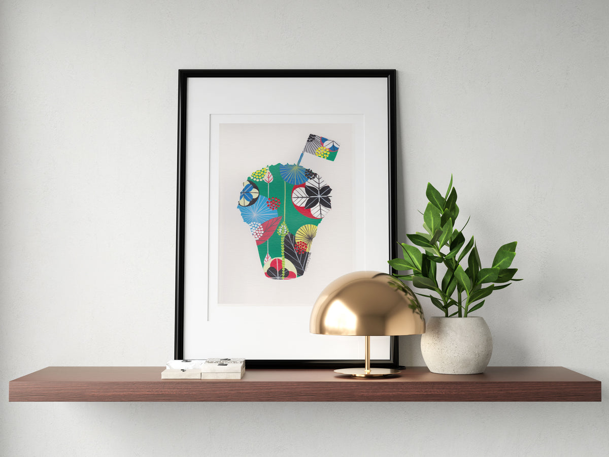 A framed fine art print, by Lis Gonçalves. Open edition, signed by the artist (printed in Hahnemühle matt fibre paper) featuring a colorful manjerico basil plant on a wooden shelf with a gold lamp and plant.