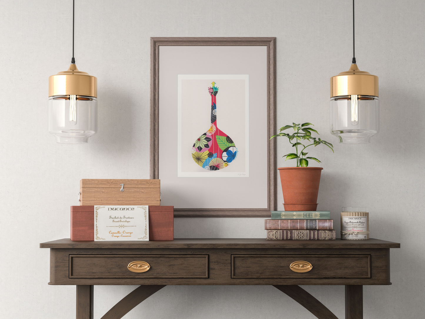 A framed fine art print, by Lis Gonçalves. Open edition, signed by the artist (printed in Hahnemühle matt fibre paper) featuring a colorful Portuguese guitar on a wooden console table with decorative items against a gray wall